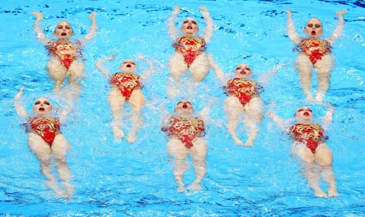 Synced Laughter: Hilarious Moments in Synchronized Swimming