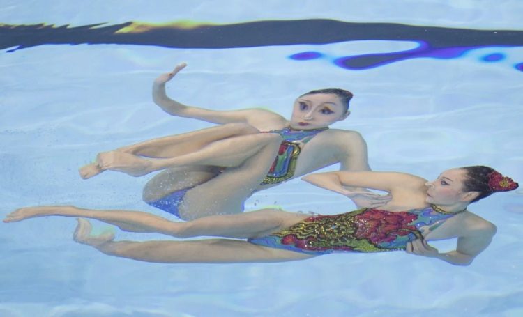 Synced Laughter: Hilarious Moments in Synchronized Swimming